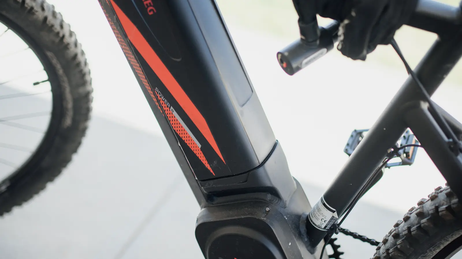 Close-up photo of an e-bike frame with an integrated battery pack.
